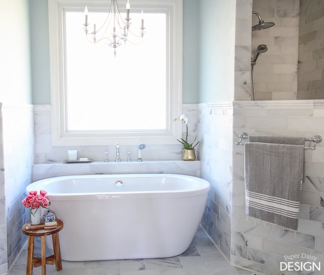 White Marble Tiled Niches Filled with Candles Over Tub - Transitional -  Bathroom