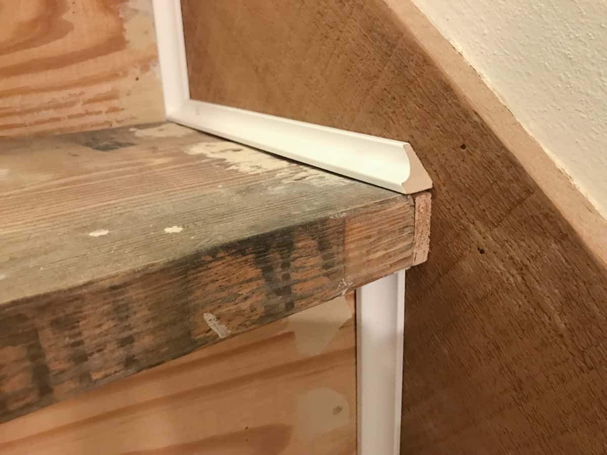 Add trim to cover gaps in stairs