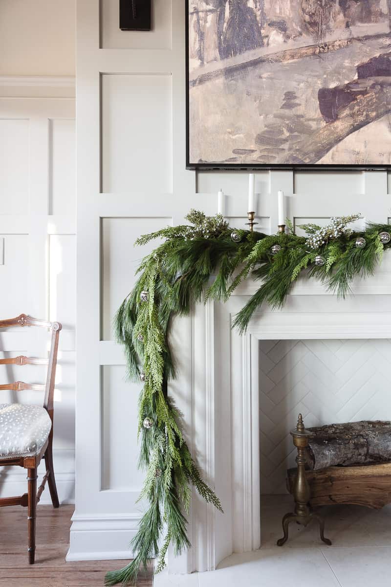 Christmas Mantel Mixing Faux and Fresh Greenery with grey accents ...