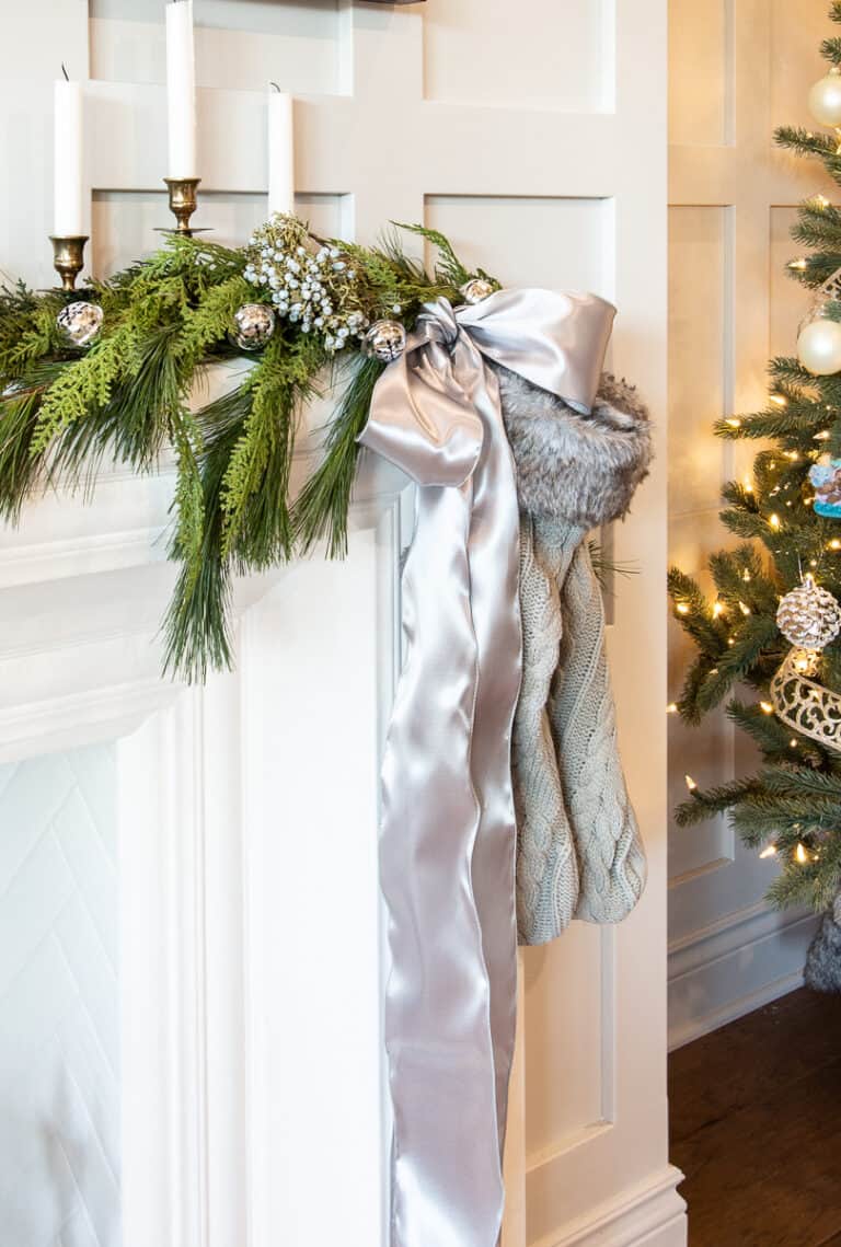 Christmas Mantel Mixing Faux and Fresh Greenery with grey accents ...